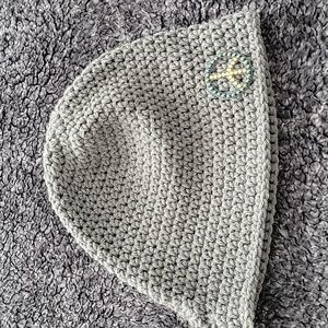 Grey beanie, homemade,OSFM,Swarovski crystals that the peace sign is made of.